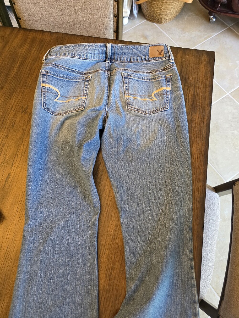 American Eagle Women's Light Blue Flare Jeans - Classic Back Pocket Detail